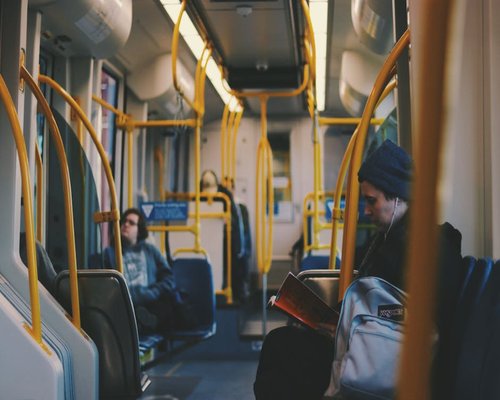 Person commuting comfortably on a city train